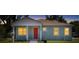 Charming single-story home boasts a well-maintained lawn, neutral paint, and inviting front porch at 1301 12Th S St, St Petersburg, FL 33705