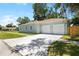 Ample two-car garage provides plenty of parking space on a generous paved driveway for the home at 1301 12Th S St, St Petersburg, FL 33705