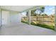 Covered patio overlooking the fenced backyard at 1301 12Th S St, St Petersburg, FL 33705