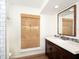 Renovated bathroom featuring a modern vanity, framed mirror, and stylish finishes at 1471 Arcadia Ave, Sarasota, FL 34232