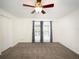 Empty bedroom featuring plush carpet, neutral walls, and ample natural light at 1471 Arcadia Ave, Sarasota, FL 34232