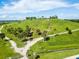 Expansive view of the grassy terrain and walking paths at the Celery Fields park at 1471 Arcadia Ave, Sarasota, FL 34232