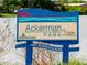 Ackerman Park sign indicates location along Interstate Blvd with pond backdrop at 1471 Arcadia Ave, Sarasota, FL 34232
