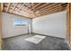 Unfinished bedroom featuring open ceiling with ceiling fan, a window and natural light at 15 Seaside Ct, Holmes Beach, FL 34217