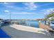 Dock view, showcasing the boats, water access, and waterfront community at 15 Seaside Ct, Holmes Beach, FL 34217