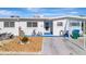 Charming single-story home with a well-maintained yard and a cozy, welcoming entrance at 15 Seaside Ct, Holmes Beach, FL 34217