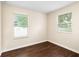 Bedroom with wood-look floors and lots of natural light from dual windows at 1739 16Th S Ave, St Petersburg, FL 33712