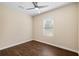 Bright bedroom with wood floors and a modern ceiling fan and a large window at 1739 16Th S Ave, St Petersburg, FL 33712