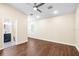 Spacious bedroom featuring wood floors, neutral walls, recessed lights, and a bathroom at 1739 16Th S Ave, St Petersburg, FL 33712