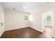 This airy bedroom offers wood floors, a modern ceiling fan and ample natural light at 1739 16Th S Ave, St Petersburg, FL 33712