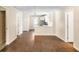 Open-concept living area features wood floors, neutral paint, and an eat-in kitchen with stainless appliances at 1739 16Th S Ave, St Petersburg, FL 33712