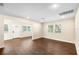 Open living space featuring beautiful hardwood floors, neutral walls, and abundant natural light at 1739 16Th S Ave, St Petersburg, FL 33712