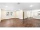 Spacious living and dining area featuring hardwood floors, recessed lighting, and neutral wall paint at 1739 16Th S Ave, St Petersburg, FL 33712