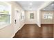 Inviting living space featuring hardwood floors and neutral walls, flooded with natural light at 1739 16Th S Ave, St Petersburg, FL 33712