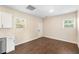 Bright living room featuring wood floors, white walls, natural light and neutral finishes at 1739 16Th S Ave, St Petersburg, FL 33712