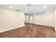 Large open living area features modern recessed lighting and wood-look floors at 1739 16Th S Ave, St Petersburg, FL 33712