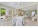 Bright sunroom connected to other rooms and featuring views of the backyard and abundant natural light at 1870 Jasmine Dr, Sarasota, FL 34239