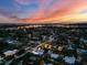 Breathtaking aerial view of the community at dusk, showcasing the stunning skyline and vibrant neighborhood at 2305 Pine Ter, Sarasota, FL 34231