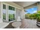Balcony with a sliding glass door and patio furniture at 2305 Pine Ter, Sarasota, FL 34231