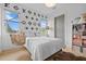 Inviting bedroom with a unique hammock chair, custom accent wall, and stylish decor at 2305 Pine Ter, Sarasota, FL 34231