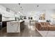Contemporary kitchen featuring modern appliances, a large island, and an open layout at 2305 Pine Ter, Sarasota, FL 34231