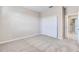 Bedroom with large closet and neutral carpeting at 23445 Collina Way # 10103, Port Charlotte, FL 33980