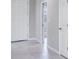Hallway features tile floors and a view to the home's exterior at 23445 Collina Way # 10103, Port Charlotte, FL 33980