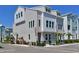 Charming townhome exterior with a well-manicured landscape, offering a welcoming curb appeal at 2401 Ezzell Ct, Sarasota, FL 34237