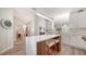 Spacious kitchen featuring a center island with seating, modern cabinets, and marble countertops at 3016 Highlands Bridge Rd, Sarasota, FL 34235