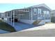 Cozy single-Gathering home with a convenient carport, manicured lawn, and a charming facade at 3333 26Th E Ave # 1220, Bradenton, FL 34208