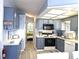Efficient kitchen layout with modern appliances, ample counter space, and stylish cabinetry at 3333 26Th E Ave # 1220, Bradenton, FL 34208