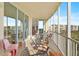 Spacious balcony featuring comfortable seating with skyline views at 3603 N Point Rd # 702, Osprey, FL 34229