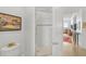 Clean bathroom with a glass-enclosed shower and view into a brightly lit living area at 3603 N Point Rd # 702, Osprey, FL 34229