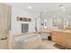 Bright bathroom featuring a soaking tub, glass shower, and large vanity with storage at 3603 N Point Rd # 702, Osprey, FL 34229