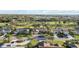 Aerial view of the charming home and community, showcasing beautiful landscaping and neighborhood charm at 3876 Torrey Pines Blvd, Sarasota, FL 34238