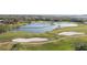 Picturesque golf course with water features, sand traps, and lush greens, perfect for golfing enthusiasts at 3876 Torrey Pines Blvd, Sarasota, FL 34238