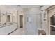 Modern bathroom featuring a spacious glass shower, granite countertops, and tiled floors at 3982 Chatsworth Greene # 37, Sarasota, FL 34235