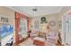 Cozy sitting room with lots of natural light, comfortable seating, and decorative touches at 3982 Chatsworth Greene # 37, Sarasota, FL 34235