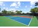 Close-up of community pickleball courts, ready for a friendly match at 4109 Cascina Way, Sarasota, FL 34238