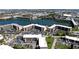 Aerial view of the condo community with lake views, amenities and well-kept grounds at 4133 Heron Way # E202, Bradenton, FL 34205