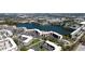 Aerial view of the condo community with lake views, amenities and well-kept grounds at 4133 Heron Way # E202, Bradenton, FL 34205