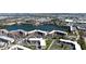 Aerial view of the condo community with lake views, amenities and well-kept grounds at 4133 Heron Way # E202, Bradenton, FL 34205