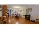 Open dining area with hardwood floors and ample natural light at 4133 Heron Way # E202, Bradenton, FL 34205
