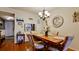 Dining room with a chandelier and stylish decor at 4133 Heron Way # E202, Bradenton, FL 34205