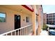 Exterior front door to the condo with outdoor space at 4133 Heron Way # E202, Bradenton, FL 34205