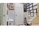 Functional hallway leading to office space with stylish decor and certificates at 4133 Heron Way # E202, Bradenton, FL 34205