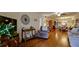 Cozy living area with hardwood floors and comfortable furnishings at 4133 Heron Way # E202, Bradenton, FL 34205