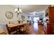 Spacious living area featuring hardwood floors and plenty of natural light at 4133 Heron Way # E202, Bradenton, FL 34205