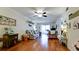 Spacious living area with hardwood floors and sliding glass doors at 4133 Heron Way # E202, Bradenton, FL 34205
