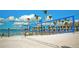 A beach volleyball net set up on the sandy shore with a waterfront view at 4133 Heron Way # E202, Bradenton, FL 34205